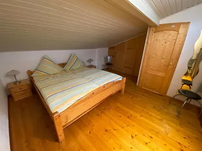 Ein Bett oder Betten in einem Zimmer der Unterkunft Ferienhaus Jüngling