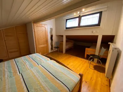 Ein Bett oder Betten in einem Zimmer der Unterkunft Ferienhaus Jüngling