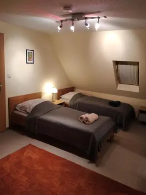 Ein Bett oder Betten in einem Zimmer der Unterkunft Haus Engelskrug