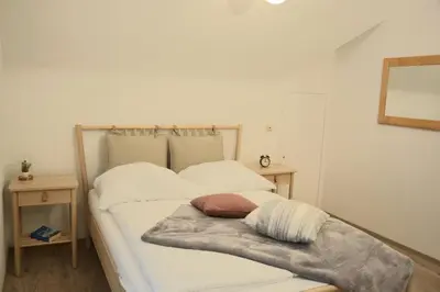 Ein Bett oder Betten in einem Zimmer der Unterkunft Ferienwohnung Traumzeit