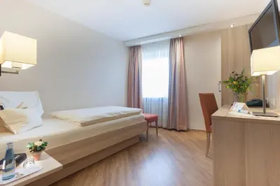 TV/Unterhaltungsangebot in der Unterkunft Eifel Hotel Schneider am Maar