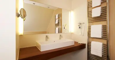 Ein Badezimmer in der Unterkunft Hotel Am Helmwartsturm
