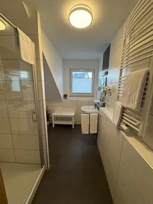 Ein Badezimmer in der Unterkunft Hotel Heimatherz