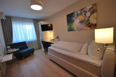 Ein Sitzbereich in der Unterkunft Hotel Heimatherz