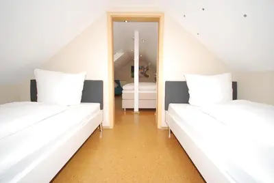 Ein Bett oder Betten in einem Zimmer der Unterkunft Hotel Heimatherz