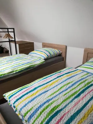 Ein Bett oder Betten in einem Zimmer der Unterkunft Präsenzhof Lay