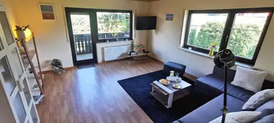 Ein Sitzbereich in der Unterkunft Ferienwohnung Landidylle Nassheck
