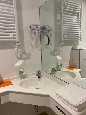 Ein Badezimmer in der Unterkunft Cafe Moselterrasse