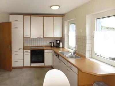 Küche/Küchenzeile in der Unterkunft Holiday Home Haus Irmgard by Interhome
