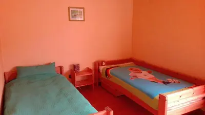Ein Bett oder Betten in einem Zimmer der Unterkunft Ferienwohnung Natur und Steine
