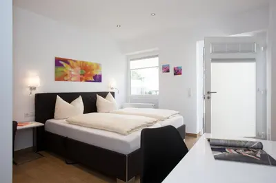 Ein Bett oder Betten in einem Zimmer der Unterkunft Mittelrhein Pension