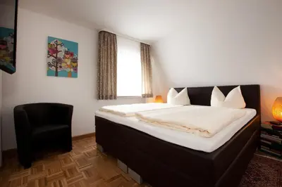 Ein Bett oder Betten in einem Zimmer der Unterkunft Mittelrhein Pension
