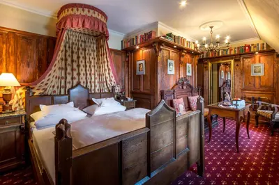 Ein Bett oder Betten in einem Zimmer der Unterkunft Burghotel auf Schönburg