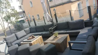 Ein Sitzbereich in der Unterkunft Hosser's Hotel Restaurant