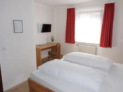 Ein Bett oder Betten in einem Zimmer der Unterkunft Hotel Restaurant Zur Pfanne