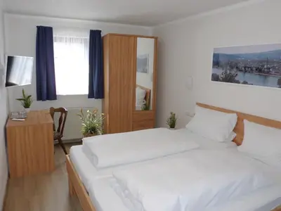Ein Bett oder Betten in einem Zimmer der Unterkunft Hotel Restaurant Zur Pfanne
