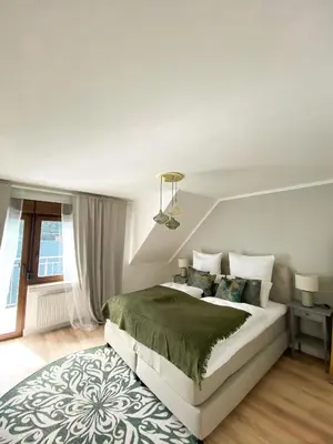 Ein Bett oder Betten in einem Zimmer der Unterkunft Haus Mosel Tales in Cochem für bis zu 9 Personen