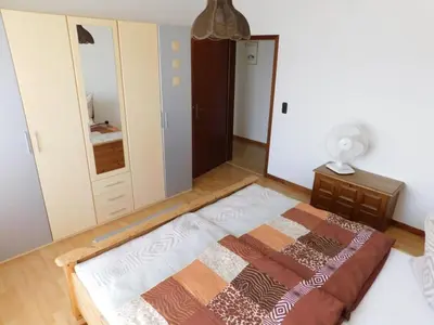 Ein Bett oder Betten in einem Zimmer der Unterkunft FeWo Inge
