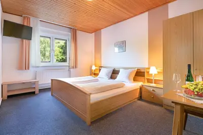Ein Bett oder Betten in einem Zimmer der Unterkunft Hotel Deis