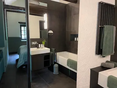 Ein Badezimmer in der Unterkunft LÖFFELMÜHLE BOUTIQUE BED AND BREAKFAST