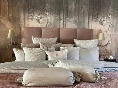 Ein Bett oder Betten in einem Zimmer der Unterkunft LÖFFELMÜHLE BOUTIQUE BED AND BREAKFAST
