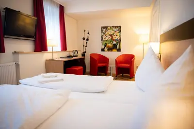 Ein Bett oder Betten in einem Zimmer der Unterkunft Altes Pfarrhaus