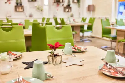 Ein Restaurant oder anderes Speiselokal in der Unterkunft Hotel Berghof