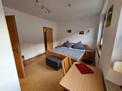 Ein Bett oder Betten in einem Zimmer der Unterkunft Ferienhaus Winzerauszeit