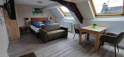 Ein Sitzbereich in der Unterkunft Pension am Lieserpfad