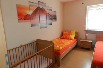 Ein Bett oder Betten in einem Zimmer der Unterkunft Petriheil