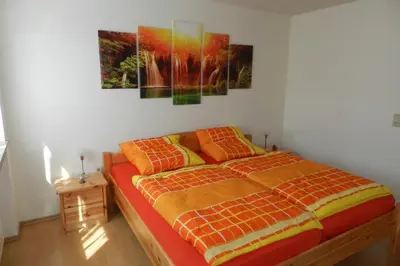 Ein Bett oder Betten in einem Zimmer der Unterkunft Petriheil