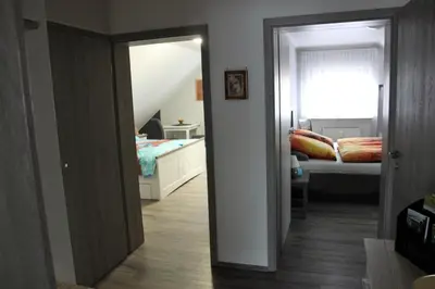 Ein Bett oder Betten in einem Zimmer der Unterkunft Fewo Am Kendel
