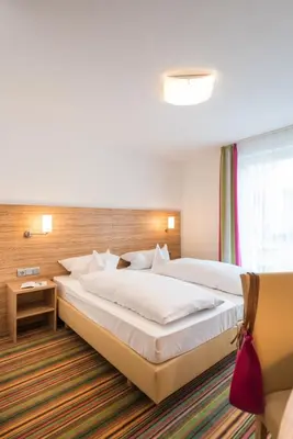 Ein Bett oder Betten in einem Zimmer der Unterkunft Hotel Haus Appel