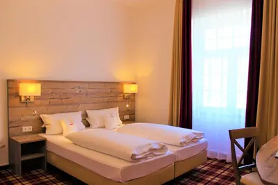 Ein Bett oder Betten in einem Zimmer der Unterkunft Hotel Haus Appel