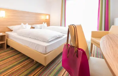 Ein Bett oder Betten in einem Zimmer der Unterkunft Hotel Haus Appel
