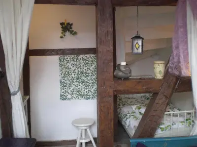 Ein Bett oder Betten in einem Zimmer der Unterkunft Alte Schule Kirmutscheid