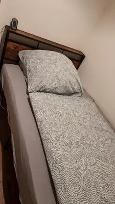 Ein Bett oder Betten in einem Zimmer der Unterkunft Ferienwohnung Kell am See