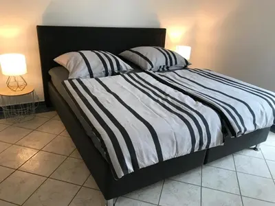 Ein Bett oder Betten in einem Zimmer der Unterkunft Blue House Mosel