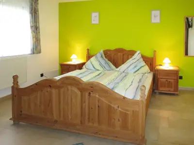 Ein Bett oder Betten in einem Zimmer der Unterkunft Apartment Dreser by Interhome