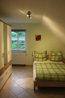 Ein Bett oder Betten in einem Zimmer der Unterkunft Landhaus Monika