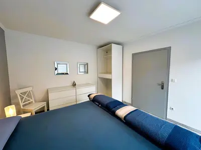 Ein Bett oder Betten in einem Zimmer der Unterkunft Fewo Himmelblau