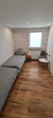 Ein Bett oder Betten in einem Zimmer der Unterkunft Ferienhaus Johann