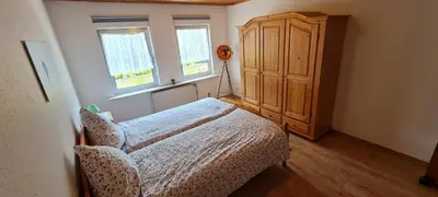 Ein Bett oder Betten in einem Zimmer der Unterkunft Ferienhaus Johann