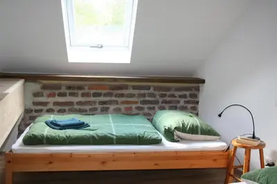 Ein Bett oder Betten in einem Zimmer der Unterkunft Isi-Hof