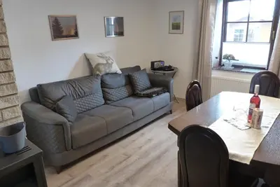 Ein Sitzbereich in der Unterkunft Ferienwohnung Hügelhaus