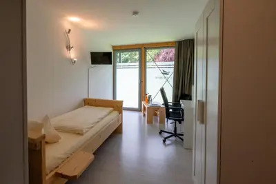 Ein Bett oder Betten in einem Zimmer der Unterkunft Hotel Vicinity