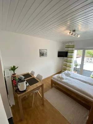 Ein Bett oder Betten in einem Zimmer der Unterkunft Kleines gemütliches Studio 1 in Moselnähe