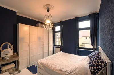 Ein Bett oder Betten in einem Zimmer der Unterkunft Altes Kappellchen im alten Schwesternhaus