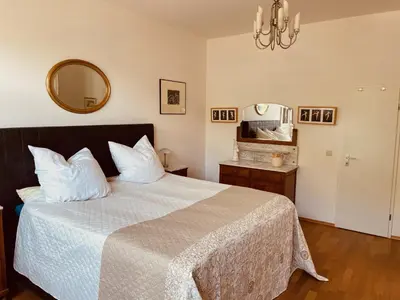 Ein Bett oder Betten in einem Zimmer der Unterkunft BEL ETAGE