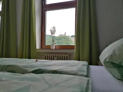 Ein Bett oder Betten in einem Zimmer der Unterkunft Mosel-Ferienwohnung Bewo